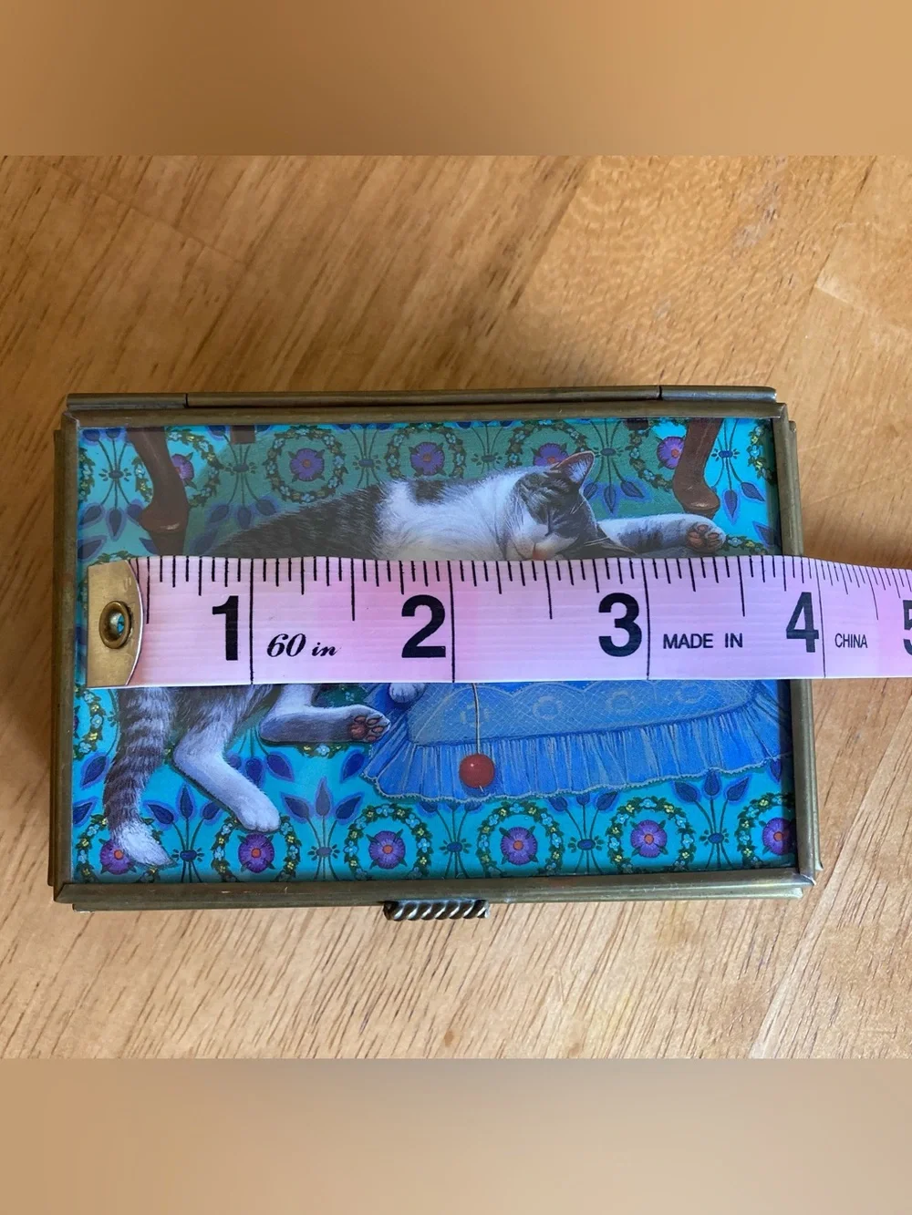Glass jewelry box with cat illustration